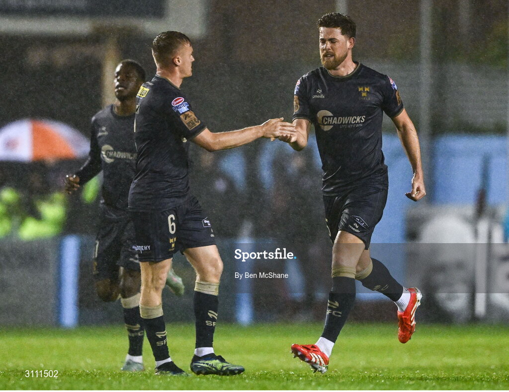 18 April 2025; Sam Bone of Shelbourne, right, celebrates with team-mate JJ Lunney after scoring his side's second goal during the SSE Airtricity Men's Premier Division match between Drogheda United and Shelbourne at Sullivan & Lambe Park in Drogheda, Louth. Photo by Ben McShane/Sportsfile