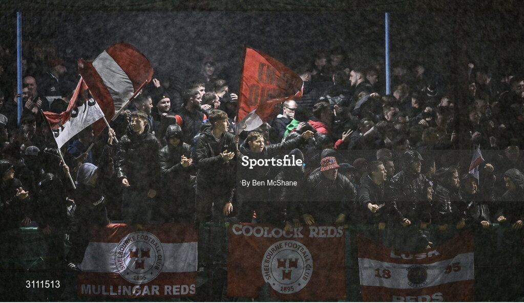 18 April 2025; Shelbourne supporters celebrate their side's second goal scored by Sam Bone during the SSE Airtricity Men's Premier Division match between Drogheda United and Shelbourne at Sullivan & Lambe Park in Drogheda, Louth. Photo by Ben McShane/Sportsfile
