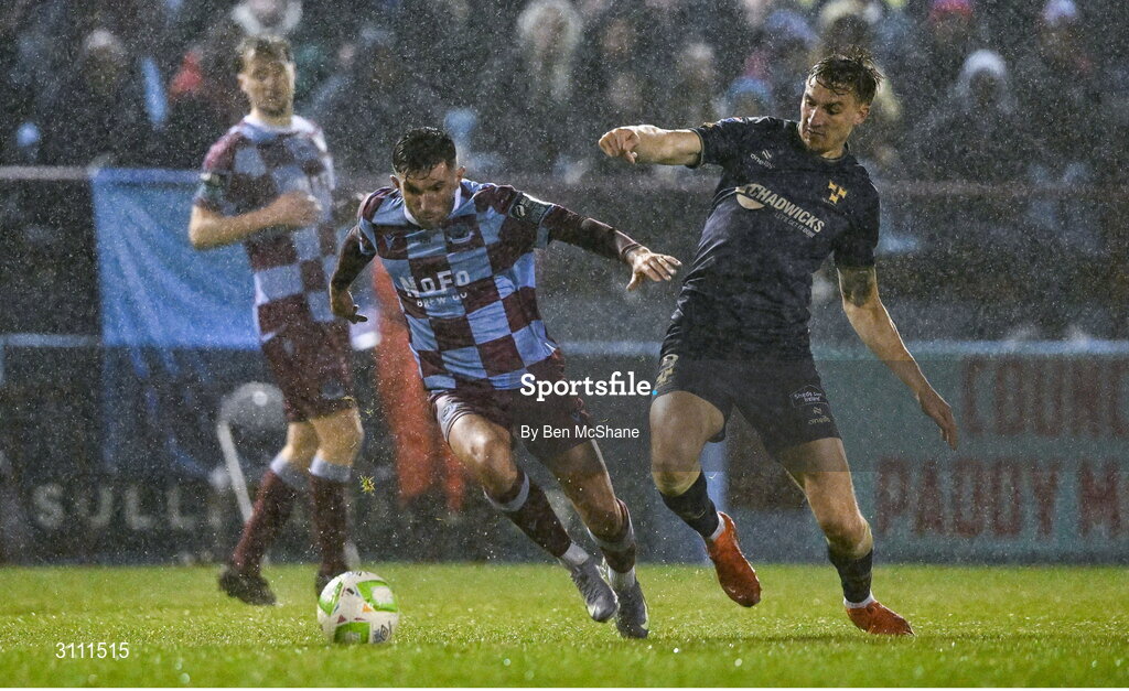 18 April 2025; Luke Heeney of Drogheda United in action against Sean Boyd of Shelbourne during the SSE Airtricity Men's Premier Division match between Drogheda United and Shelbourne at Sullivan & Lambe Park in Drogheda, Louth. Photo by Ben McShane/Sportsfile