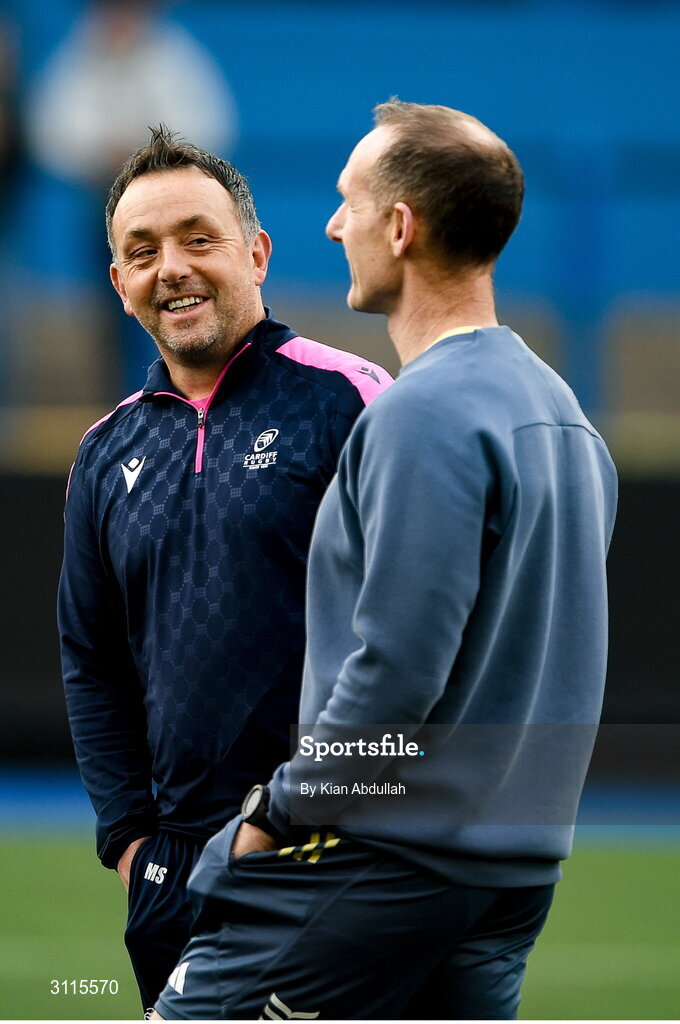 25 April 2025; Cardiff head coach Matt Sherratt with Munster Interim head coach Ian Costello before the United Rugby Championship match between Cardiff and Munster at Cardiff Arms Park in Cardiff, Wales. Photo by Kian Abdullah/Sportsfile