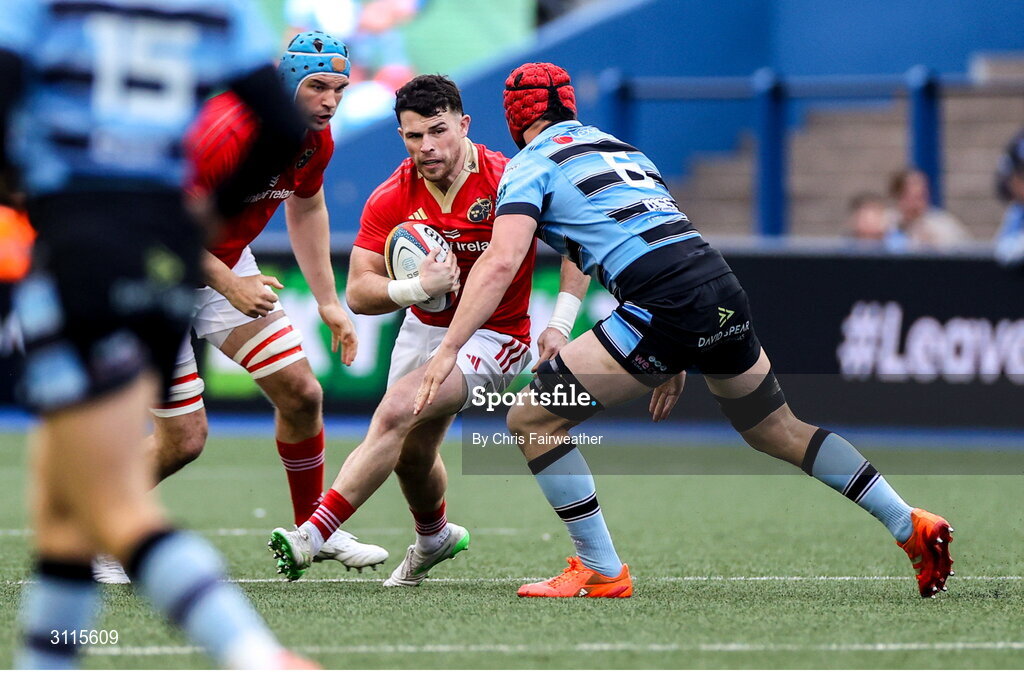 25 April 2025; Calvin Nash of Munster is tackled by James Botham of Cardiff during the United Rugby Championship match between Cardiff and Munster at Cardiff Arms Park in Cardiff, Wales. Photo by Chris Fairweather/Sportsfile