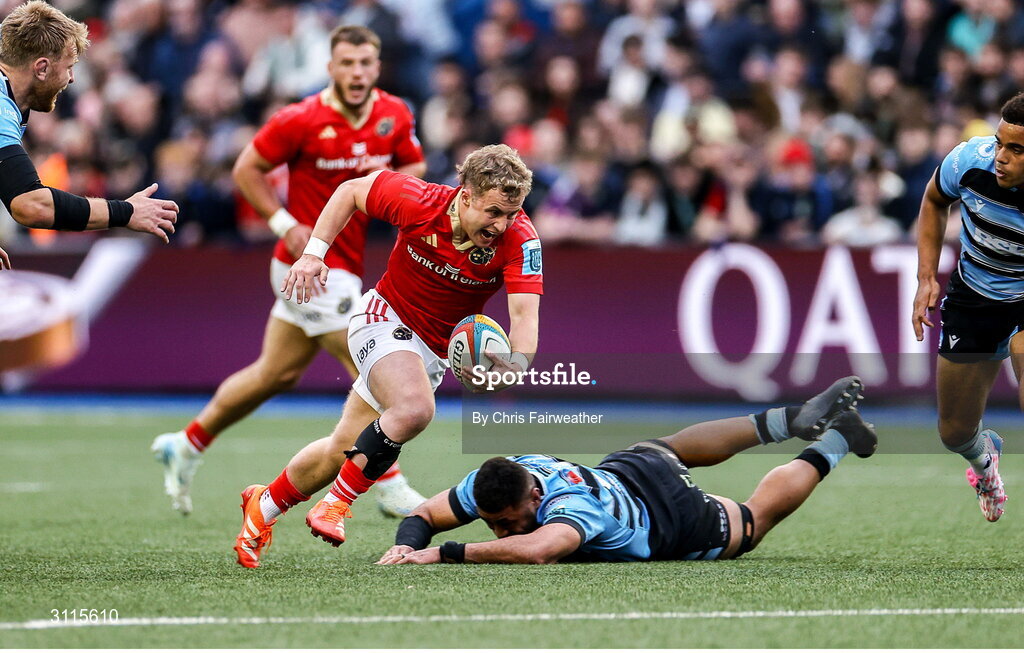 25 April 2025; Craig Casey of Munster evades a tackle by Taulupe Faletau of Cardiff during the United Rugby Championship match between Cardiff and Munster at Cardiff Arms Park in Cardiff, Wales. Photo by Chris Fairweather/Sportsfile