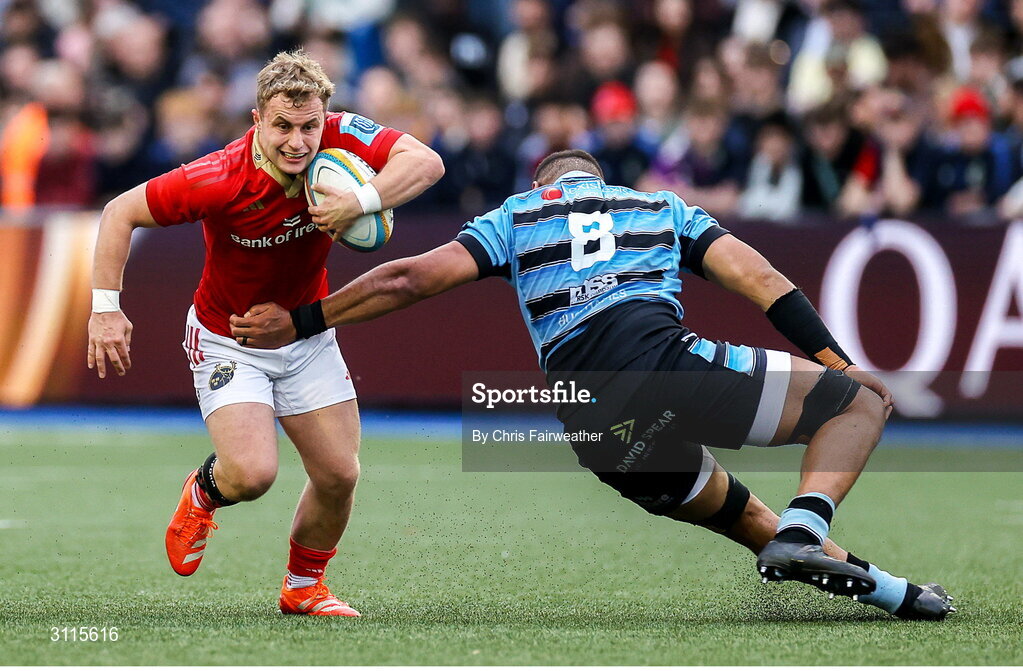 25 April 2025; Craig Casey of Munster evades a tackle by Taulupe Faletau of Cardiff during the United Rugby Championship match between Cardiff and Munster at Cardiff Arms Park in Cardiff, Wales. Photo by Chris Fairweather/Sportsfile