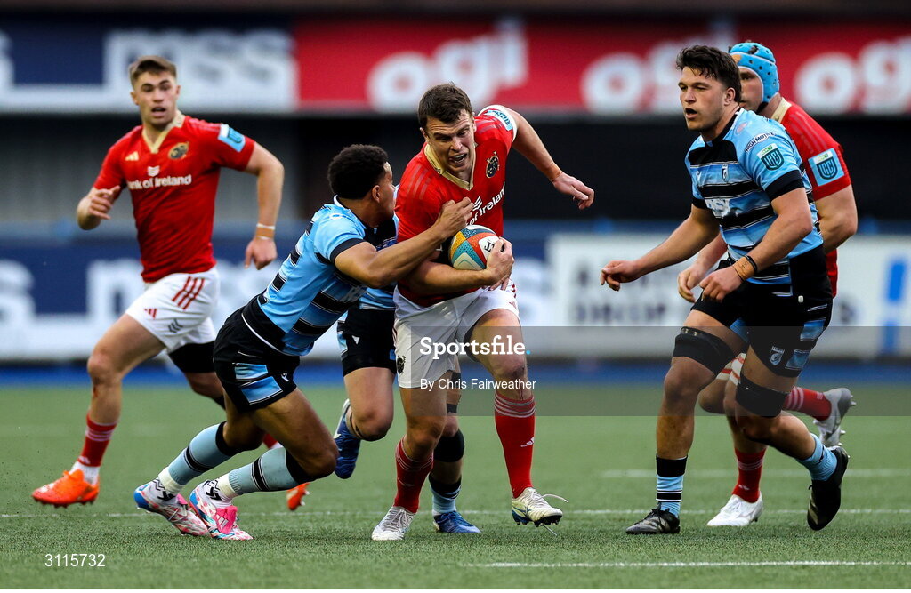 25 April 2025; Tom Farrell of Munster is tackled by Ben Thomas of Cardiff during the United Rugby Championship match between Cardiff and Munster at Cardiff Arms Park in Cardiff, Wales. Photo by Chris Fairweather/Sportsfile