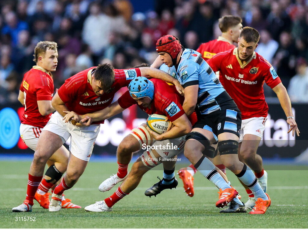 25 April 2025; Tadhg Beirne of Munster is tackled by James Botham of Cardiff during the United Rugby Championship match between Cardiff and Munster at Cardiff Arms Park in Cardiff, Wales. Photo by Chris Fairweather/Sportsfile