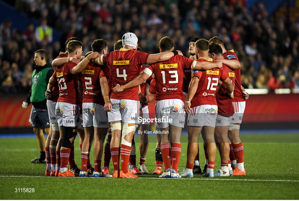 25 April 2025; The Munster team huddle during the United Rugby Championship match between Cardiff and Munster at Cardiff Arms Park in Cardiff, Wales. Photo by Kian Abdullah/Sportsfile