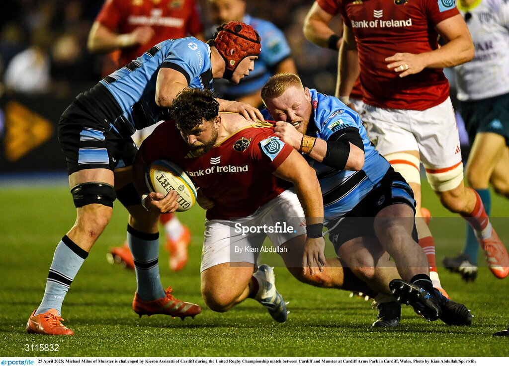 25 April 2025; Michael Milne of Munster is challenged by Kieron Assiratti of Cardiff during the United Rugby Championship match between Cardiff and Munster at Cardiff Arms Park in Cardiff, Wales. Photo by Kian Abdullah/Sportsfile