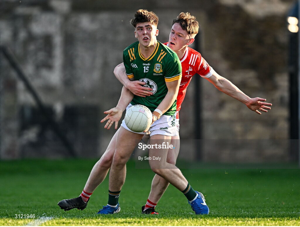 30 April 2025; Liam Jennings of Meath in action against Conor McGinty of Louth during the Dalata Hotel Group Leinster GAA Football U20 Championship final match between Meath and Louth at Cedral St Conleth’s Park in Newbridge, Kildare. Photo by Seb Daly/Sportsfile