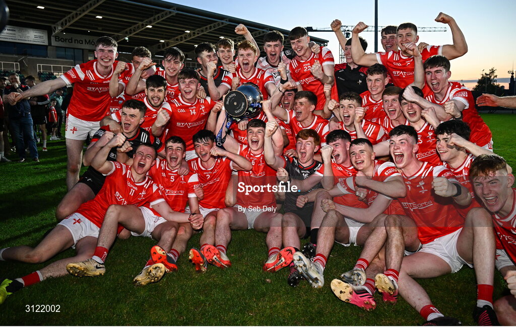 30 April 2025; Louth players celebrate with the trophy after their side's victory in the Dalata Hotel Group Leinster GAA Football U20 Championship final match between Meath and Louth at Cedral St Conleth’s Park in Newbridge, Kildare. Photo by Seb Daly/Sportsfile