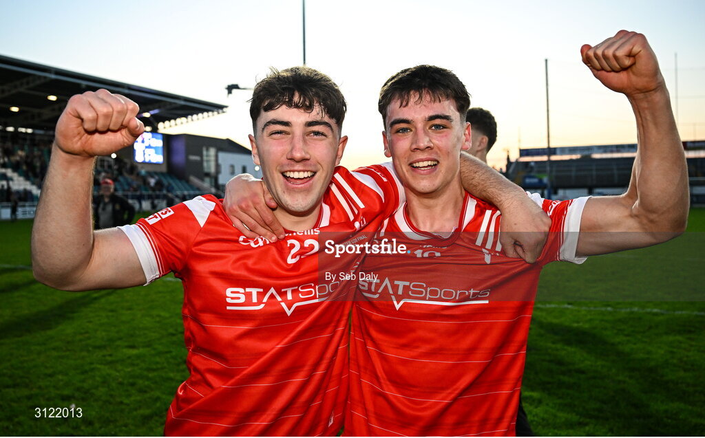 30 April 2025; Louth players Ryan Kelly, left, and Shane Lennon celebrate after their side's victory in the Dalata Hotel Group Leinster GAA Football U20 Championship final match between Meath and Louth at Cedral St Conleth’s Park in Newbridge, Kildare. Photo by Seb Daly/Sportsfile