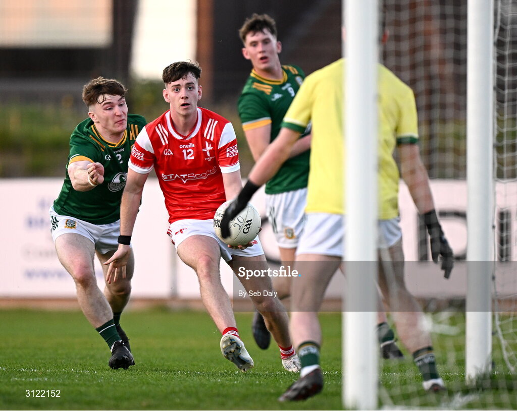30 April 2025; Pearse Grimes-Murphy of Louth in action against Sam Jordan of Meath, left, during the Dalata Hotel Group Leinster GAA Football U20 Championship final match between Meath and Louth at Cedral St Conleth’s Park in Newbridge, Kildare. Photo by Seb Daly/Sportsfile