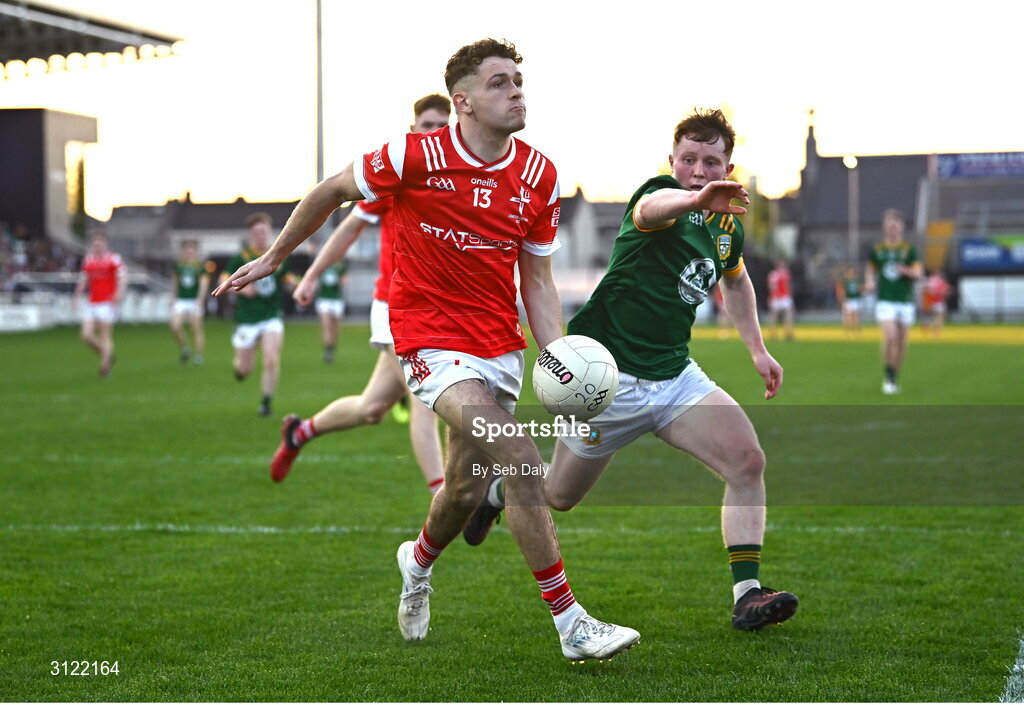 30 April 2025; Adam Gillespie of Louth in action against Ciarán O’Hare of Meath during the Dalata Hotel Group Leinster GAA Football U20 Championship final match between Meath and Louth at Cedral St Conleth’s Park in Newbridge, Kildare. Photo by Seb Daly/Sportsfile