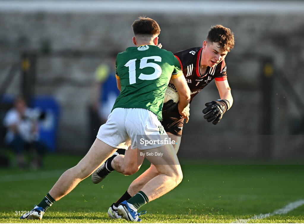 30 April 2025; Louth goalkeeper Tiarnan Markey in action against Liam Jennings of Meath during the Dalata Hotel Group Leinster GAA Football U20 Championship final match between Meath and Louth at Cedral St Conleth’s Park in Newbridge, Kildare. Photo by Seb Daly/Sportsfile