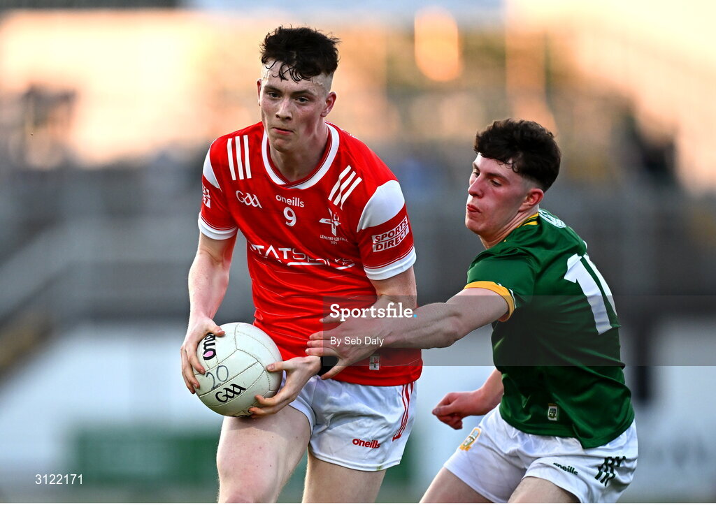 30 April 2025; James Maguire of Louth in action against Rian Stafford of Meath during the Dalata Hotel Group Leinster GAA Football U20 Championship final match between Meath and Louth at Cedral St Conleth’s Park in Newbridge, Kildare. Photo by Seb Daly/Sportsfile