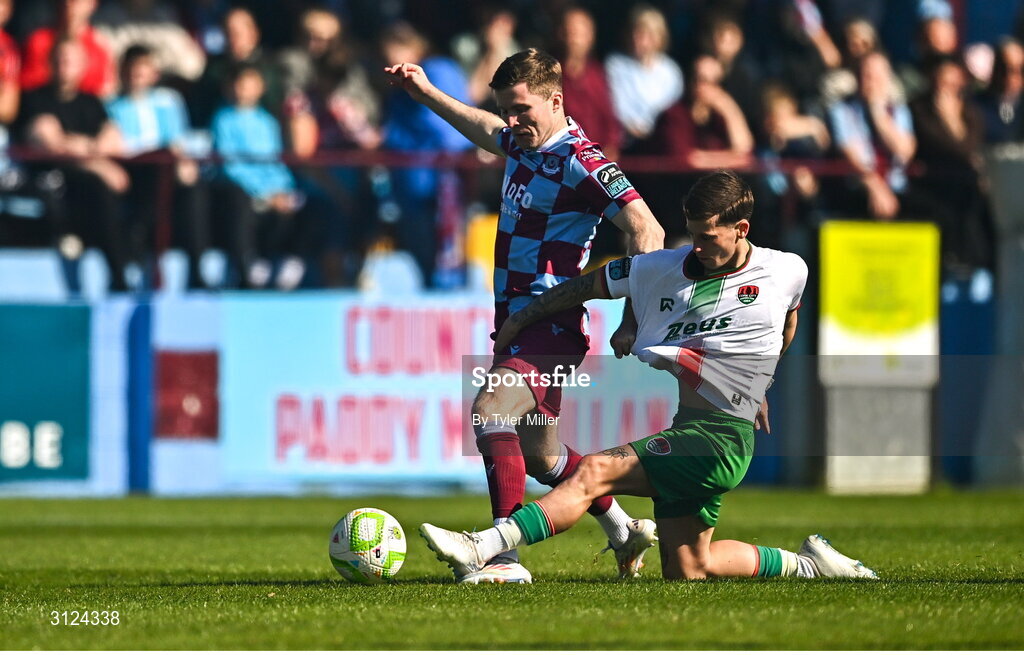 5 May 2025; Conor Kane of Drogheda United  in action against Evan McLaughlin of Cork City during the SSE Airtricity Men's Premier Division match between Drogheda United and Cork City at Sullivan & Lambe Park in Drogheda, Louth. Photo by Tyler Miller/Sportsfile