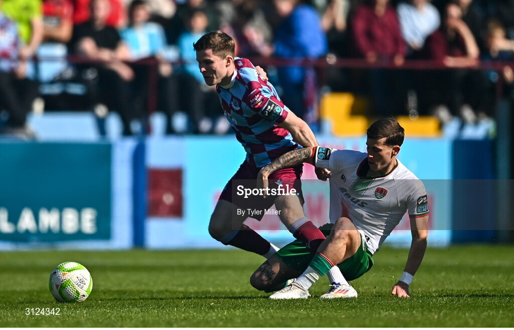 5 May 2025; Conor Kane of Drogheda United in action against Evan McLaughlin of Cork City during the SSE Airtricity Men's Premier Division match between Drogheda United and Cork City at Sullivan & Lambe Park in Drogheda, Louth. Photo by Tyler Miller/Sportsfile