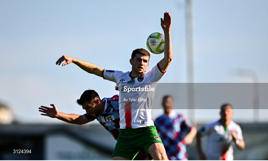 5 May 2025; Darragh Crowley of Cork City in action against Luke Heeney of Drogheda United during the SSE Airtricity Men's Premier Division match between Drogheda United and Cork City at Sullivan & Lambe Park in Drogheda, Louth. Photo by Tyler Miller/Sportsfile