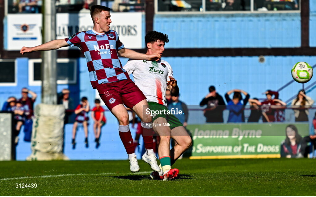 5 May 2025; Warren Davis of Drogheda United shoots to score his side's second goal despite the efforts of Harry Nevin of Cork City during the SSE Airtricity Men's Premier Division match between Drogheda United and Cork City at Sullivan & Lambe Park in Drogheda, Louth. Photo by Tyler Miller/Sportsfile