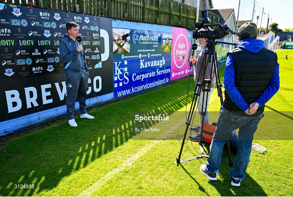 5 May 2025; Drogheda United manager Kevin Doherty is interviewed before the SSE Airtricity Men's Premier Division match between Drogheda United and Cork City at Sullivan & Lambe Park in Drogheda, Louth. Photo by Tyler Miller/Sportsfile