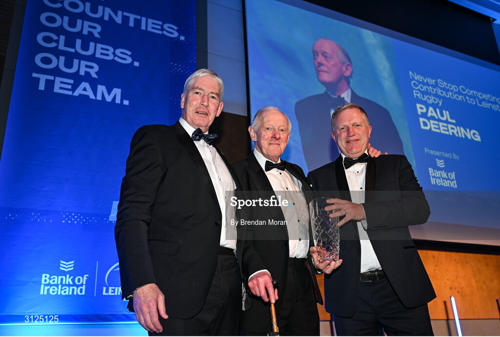 6 May 2025; Paul Deering is presented with the Bank of Ireland Never Stop Competing Award - for Contribution to Leinster Rugby by Sean Buckley of Bank of Ireland, right, and Leinster Rugby president Declan Gardiner during the Leinster Rugby awards ball 2025 at O'Reilly Hall in UCD, Dublin. Photo by Brendan Moran/Sportsfile
