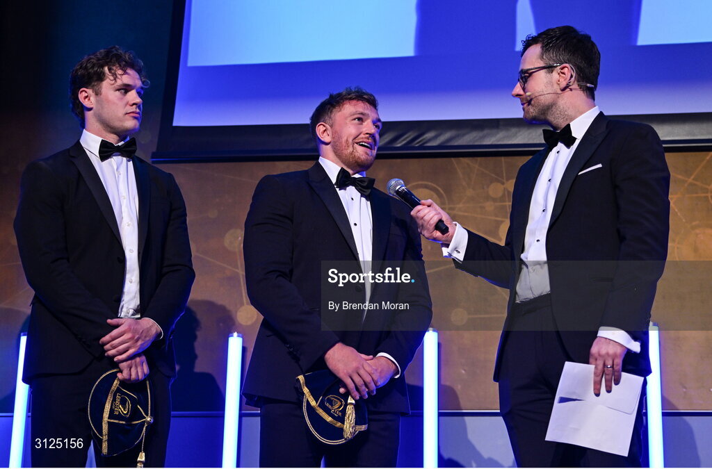 6 May 2025; Departing players Rob Russell, left, and Liam Turner are interviewed by MC Joe Molloy during the Leinster Rugby awards ball 2025 at O'Reilly Hall in UCD, Dublin. Photo by Brendan Moran/Sportsfile