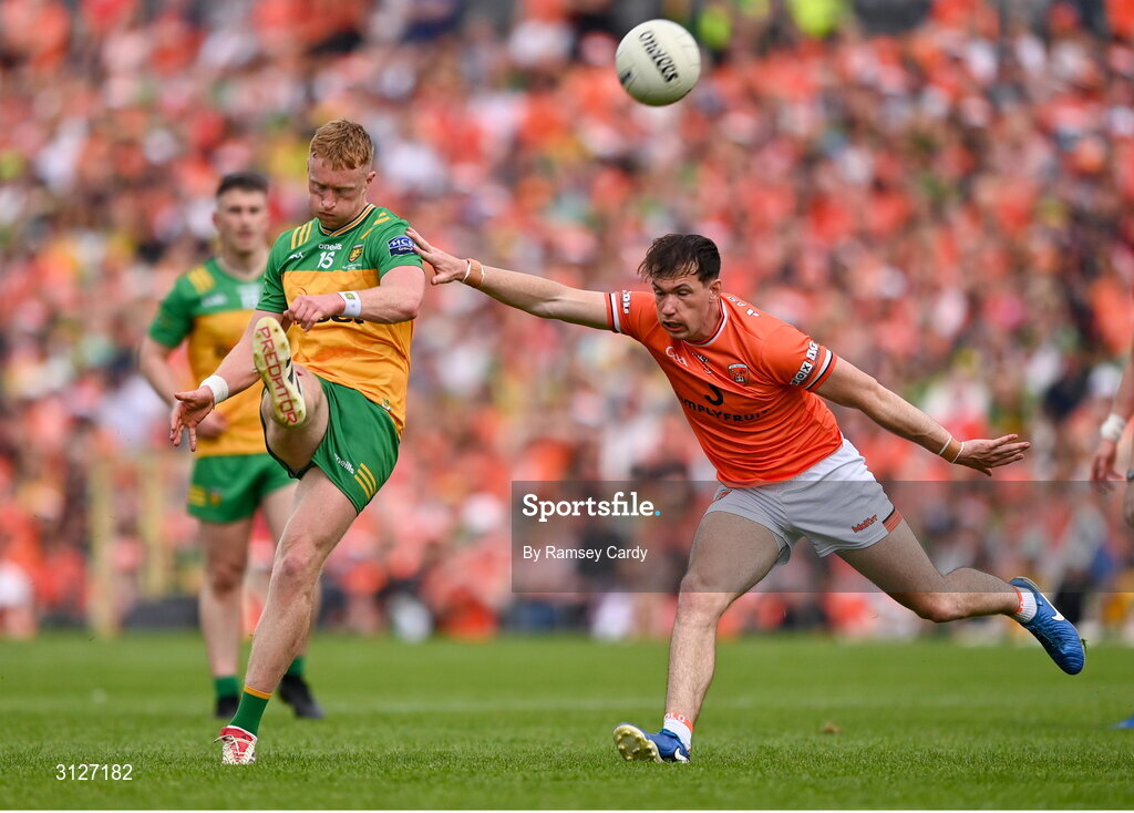 10 May 2025; Oisin Gallen of Donegal in action against Barry McCambridge of Armagh during the Ulster GAA Football Senior Championship final match between Armagh and Donegal at St Tiernach's Park in Clones, Monaghan. Photo by Ramsey Cardy/Sportsfile
