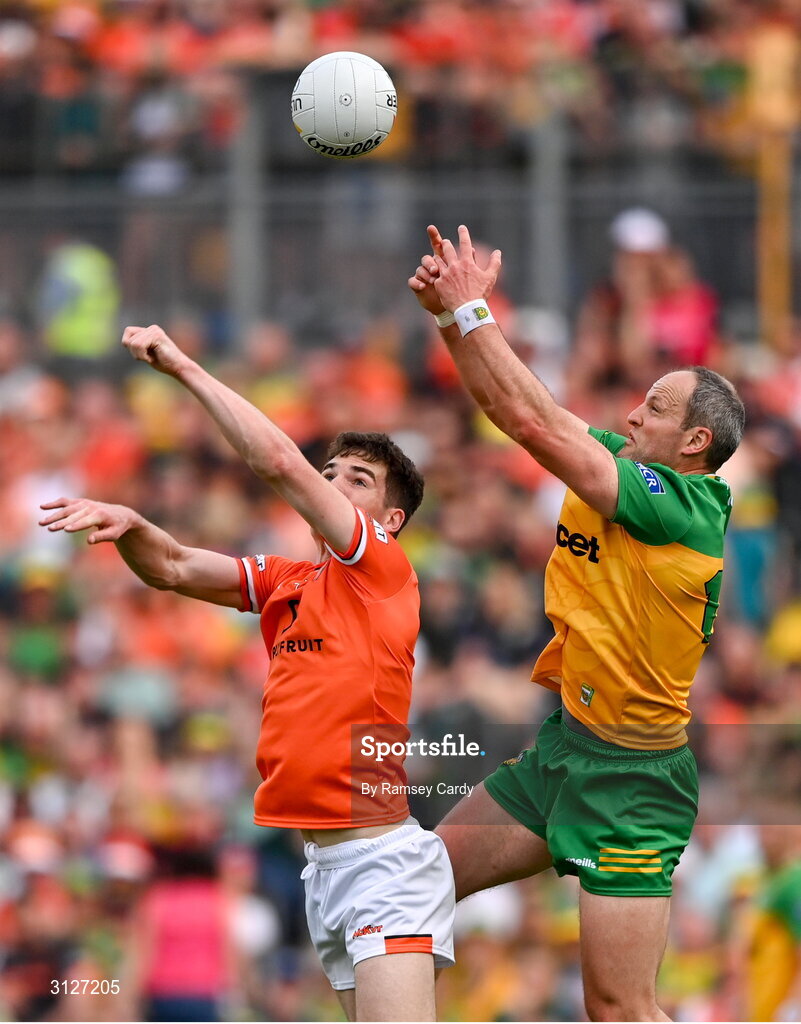 10 May 2025; Michael Murphy of Donegal in action against Jarly Óg Burns of Armagh during the Ulster GAA Football Senior Championship final match between Armagh and Donegal at St Tiernach's Park in Clones, Monaghan. Photo by Ramsey Cardy/Sportsfile