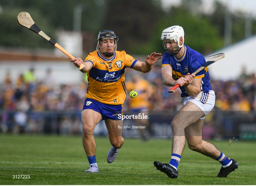 10 May 2025; Craig Morgan of Tipperary in action against David Reidy of Clare during the Munster GAA Hurling Senior Championship Round 3 match between Clare and Tipperary at Zimmer Biomet Páirc Chíosóg in Ennis, Clare. Photo by John Sheridan/Sportsfile