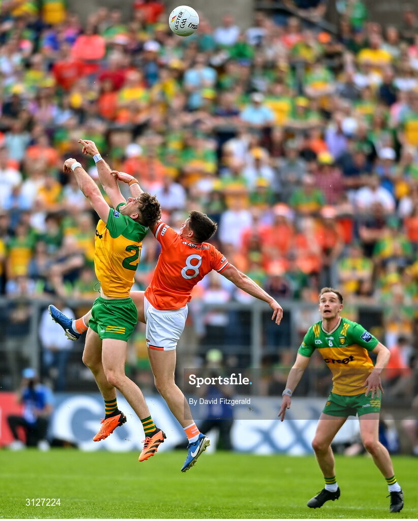 10 May 2025; Hugh McFadden of Donegal in action against Callum O'Neill of Armagh during the Ulster GAA Football Senior Championship final match between Armagh and Donegal at St Tiernach's Park in Clones, Monaghan. Photo by David Fitzgerald/Sportsfile