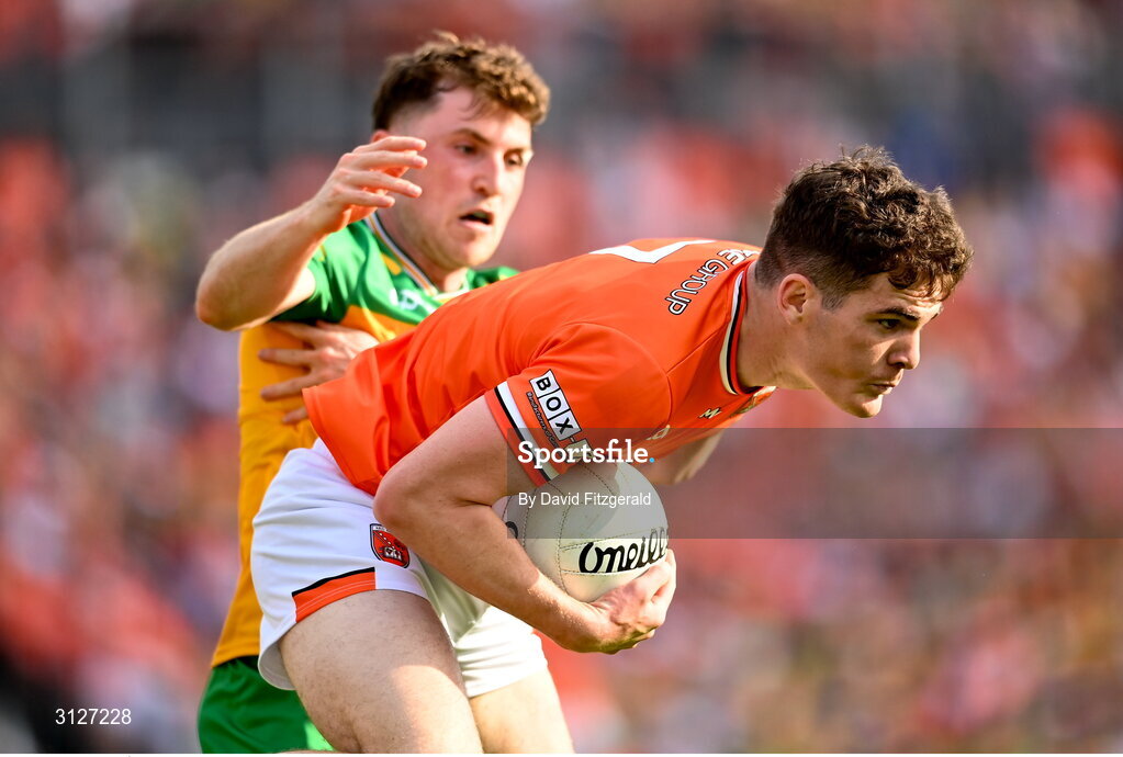 10 May 2025; Jarly Óg Burns of Armagh in action against Shane O'Donnell of Donegal during the Ulster GAA Football Senior Championship final match between Armagh and Donegal at St Tiernach's Park in Clones, Monaghan. Photo by David Fitzgerald/Sportsfile