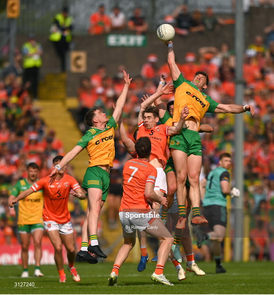 10 May 2025; Hugh McFadden of Donegal in action against Andrew Murnin of Armagh during the Ulster GAA Football Senior Championship final match between Armagh and Donegal at St Tiernach's Park in Clones, Monaghan. Photo by Ramsey Cardy/Sportsfile