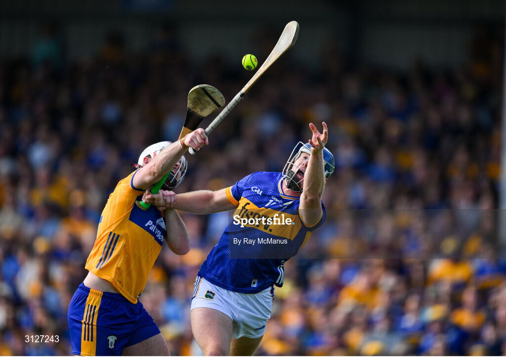 10 May 2025; Jason Forde of Tipperary in action against Conor Lean of Clare during the Munster GAA Hurling Senior Championship Round 3 match between Clare and Tipperary at Zimmer Biomet Páirc Chíosóg in Ennis, Clare. Photo by Ray McManus/Sportsfile