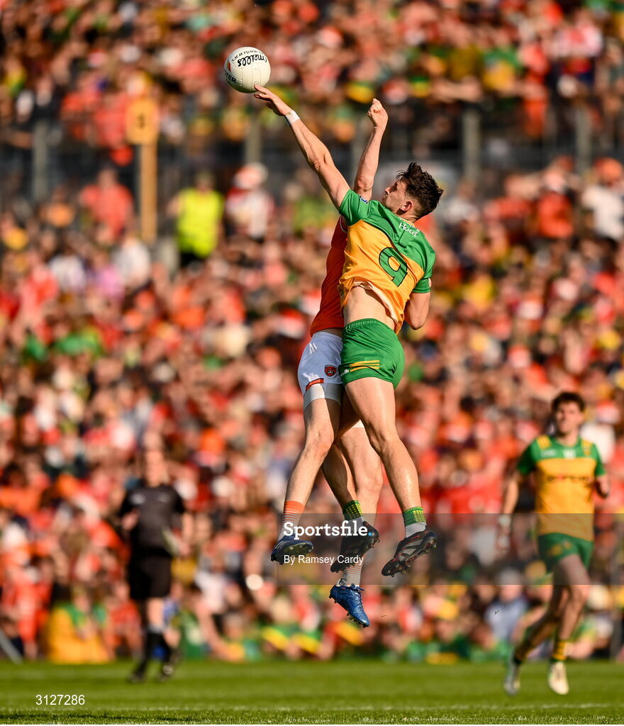 10 May 2025; Michael Langan of Donegal in action against Ben Crealey of Armagh during the Ulster GAA Football Senior Championship final match between Armagh and Donegal at St Tiernach's Park in Clones, Monaghan. Photo by Ramsey Cardy/Sportsfile