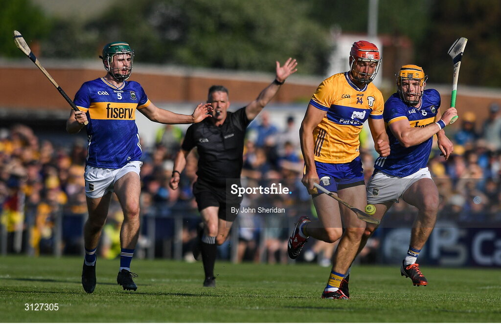 10 May 2025; Peter Duggan of Clare in action against Ronan Maher of Tipperary during the Munster GAA Hurling Senior Championship Round 3 match between Clare and Tipperary at Zimmer Biomet Páirc Chíosóg in Ennis, Clare. Photo by John Sheridan/Sportsfile