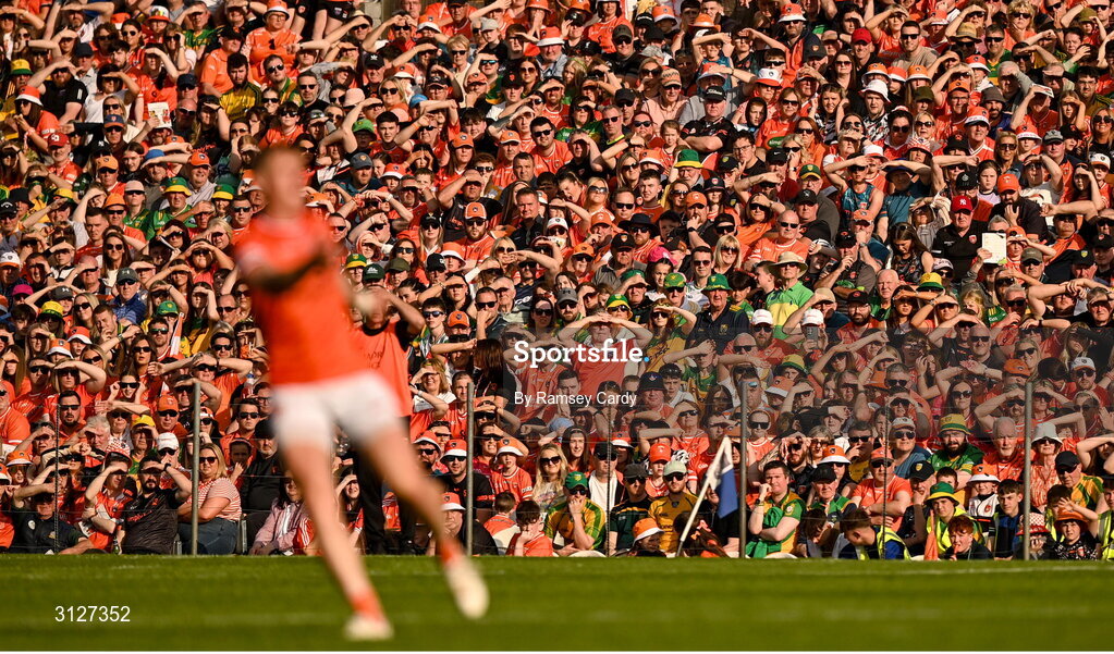 10 May 2025; Supporters watch on as Oisin O'Neill of Armagh kicks a free during the Ulster GAA Football Senior Championship final match between Armagh and Donegal at St Tiernach's Park in Clones, Monaghan. Photo by Ramsey Cardy/Sportsfile
