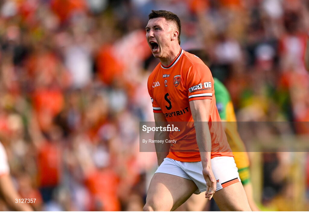 10 May 2025; Oisin Conaty of Armagh celebrates kicking a point during the Ulster GAA Football Senior Championship final match between Armagh and Donegal at St Tiernach's Park in Clones, Monaghan. Photo by Ramsey Cardy/Sportsfile