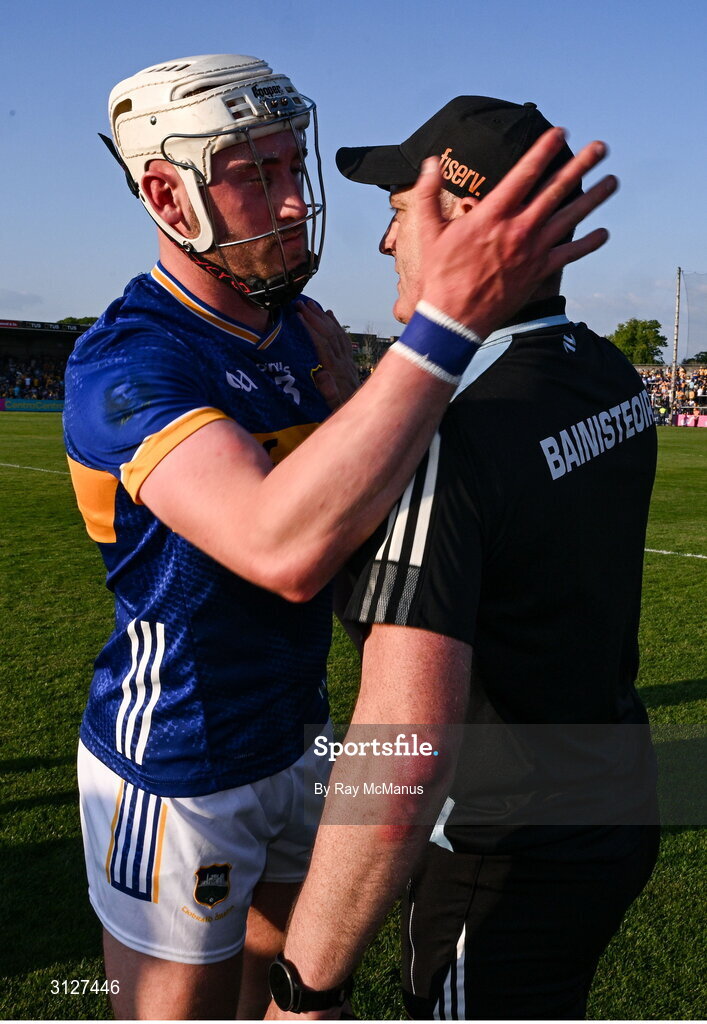 10 May 2025; Eoghan Connolly of Tipperary and manager Liam Cahill after the Munster GAA Hurling Senior Championship Round 3 match between Clare and Tipperary at Zimmer Biomet Páirc Chíosóg in Ennis, Clare. Photo by Ray McManus/Sportsfile