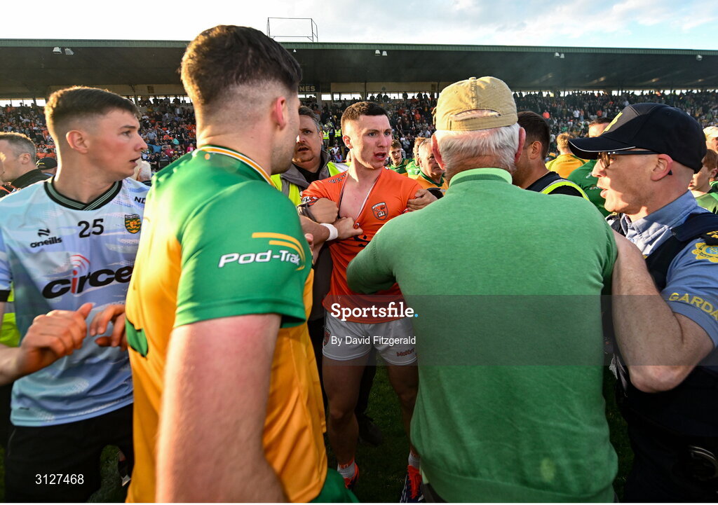 10 May 2025; Players from both sides tussle including Oisin Conaty of Armagh, centre, after the Ulster GAA Football Senior Championship final match between Armagh and Donegal at St Tiernach's Park in Clones, Monaghan. Photo by David Fitzgerald/Sportsfile
