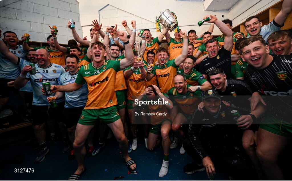 10 May 2025; The Donegal team celebrate with the Anglo-Celt Cup in the dressing room after the Ulster GAA Football Senior Championship final match between Armagh and Donegal at St Tiernach's Park in Clones, Monaghan. Photo by Ramsey Cardy/Sportsfile