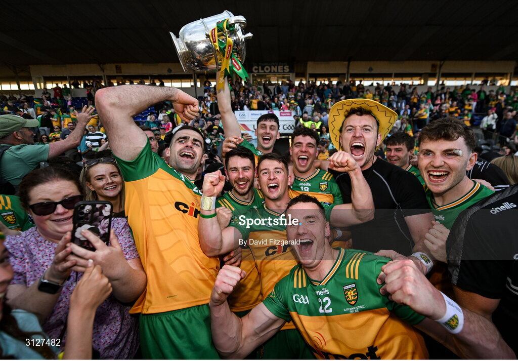 10 May 2025; Donegal players celebrate with the cup after the Ulster GAA Football Senior Championship final match between Armagh and Donegal at St Tiernach's Park in Clones, Monaghan. Photo by David Fitzgerald/Sportsfile