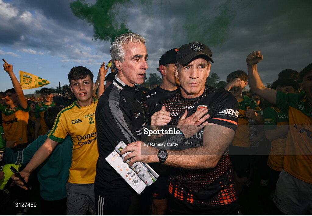 10 May 2025; Donegal manager Jim McGuinness, left, and Armagh manager Kieran McGeeney after the Ulster GAA Football Senior Championship final match between Armagh and Donegal at St Tiernach's Park in Clones, Monaghan. Photo by Ramsey Cardy/Sportsfile