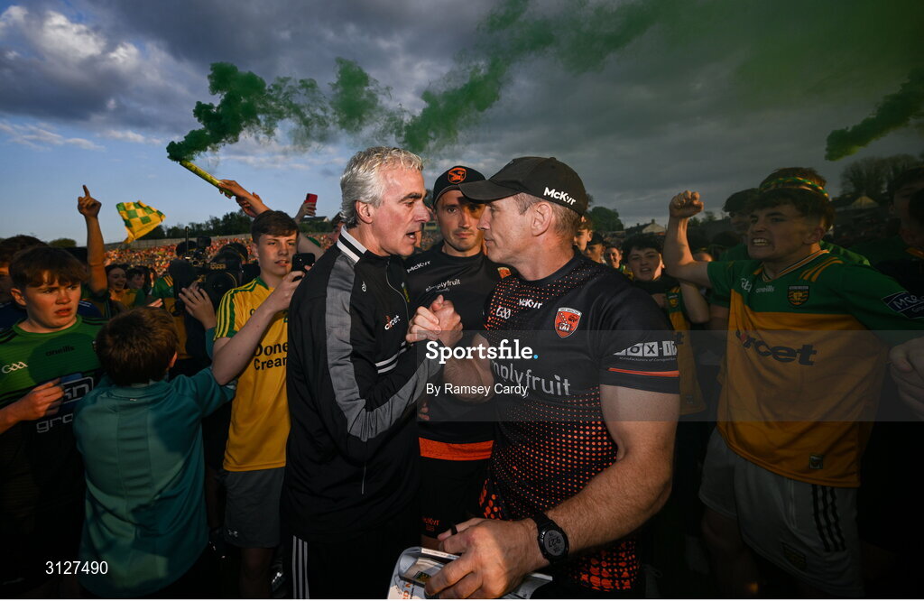 10 May 2025; Donegal manager Jim McGuinness, left, and Armagh manager Kieran McGeeney after the Ulster GAA Football Senior Championship final match between Armagh and Donegal at St Tiernach's Park in Clones, Monaghan. Photo by Ramsey Cardy/Sportsfile