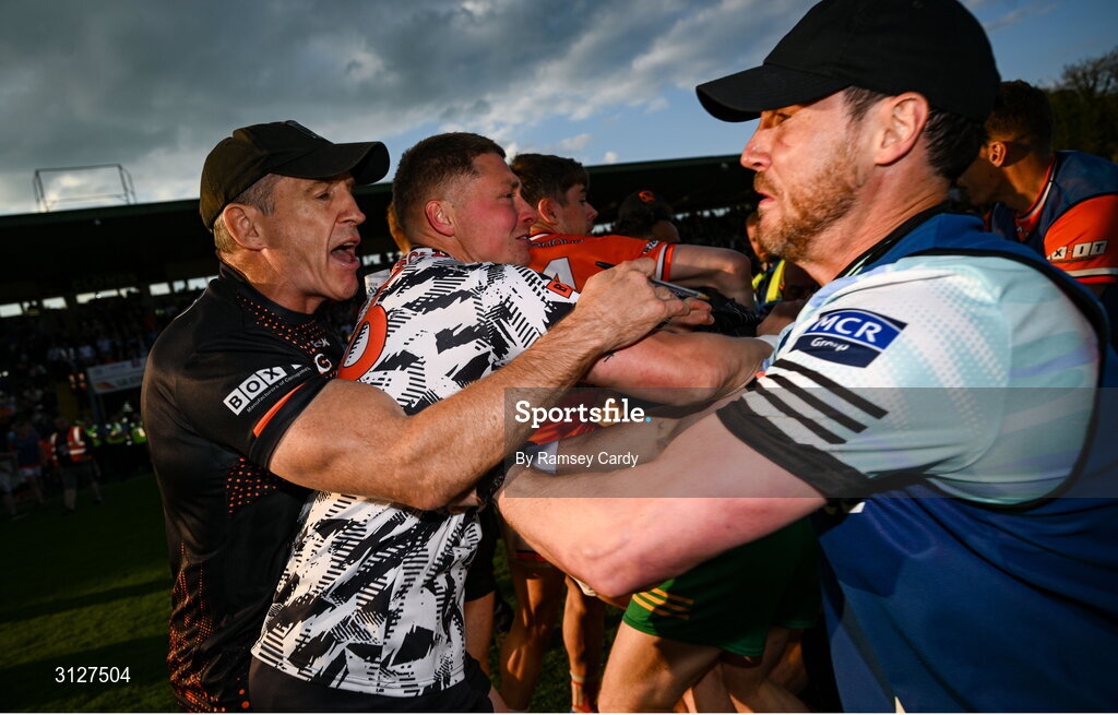 10 May 2025; Armagh goalkeeper Blaine Hughes is restrained by Armagh manager Kieran McGeeney during the Ulster GAA Football Senior Championship final match between Armagh and Donegal at St Tiernach's Park in Clones, Monaghan. Photo by Ramsey Cardy/Sportsfile