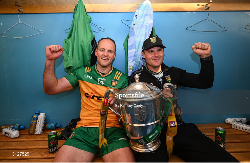 10 May 2025; Michael Murphy of Donegal and selector Neil McGee with the Anglo-Celt Cup after the Ulster GAA Football Senior Championship final match between Armagh and Donegal at St Tiernach's Park in Clones, Monaghan. Photo by Ramsey Cardy/Sportsfile