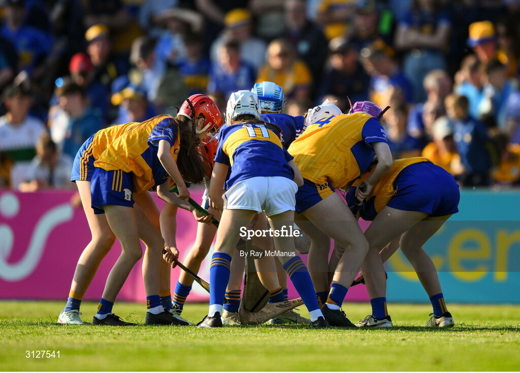 10 May 2025; School girls from both counties play a game of camogie at half time during the Munster GAA Hurling Senior Championship Round 3 match between Clare and Tipperary at Zimmer Biomet Páirc Chíosóg in Ennis, Clare. Photo by Ray McManus/Sportsfile