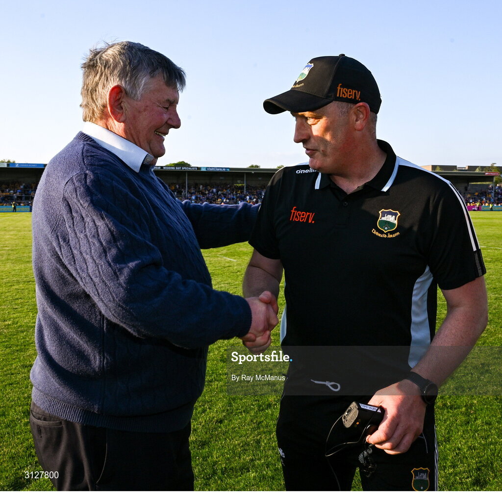 10 May 2025; Tipperary manager Liam Cahill is congratulated by Sean Fogarty after the Munster GAA Hurling Senior Championship Round 3 match between Clare and Tipperary at Zimmer Biomet Páirc Chíosóg in Ennis, Clare. Photo by Ray McManus/Sportsfile