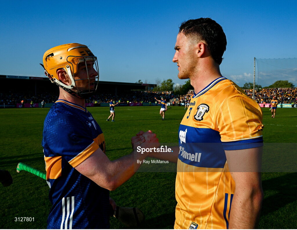 10 May 2025; Andrew Ormond of Tipperary and Darragh Lohan of Clare shake hands after the Munster GAA Hurling Senior Championship Round 3 match between Clare and Tipperary at Zimmer Biomet Páirc Chíosóg in Ennis, Clare. Photo by Ray McManus/Sportsfile