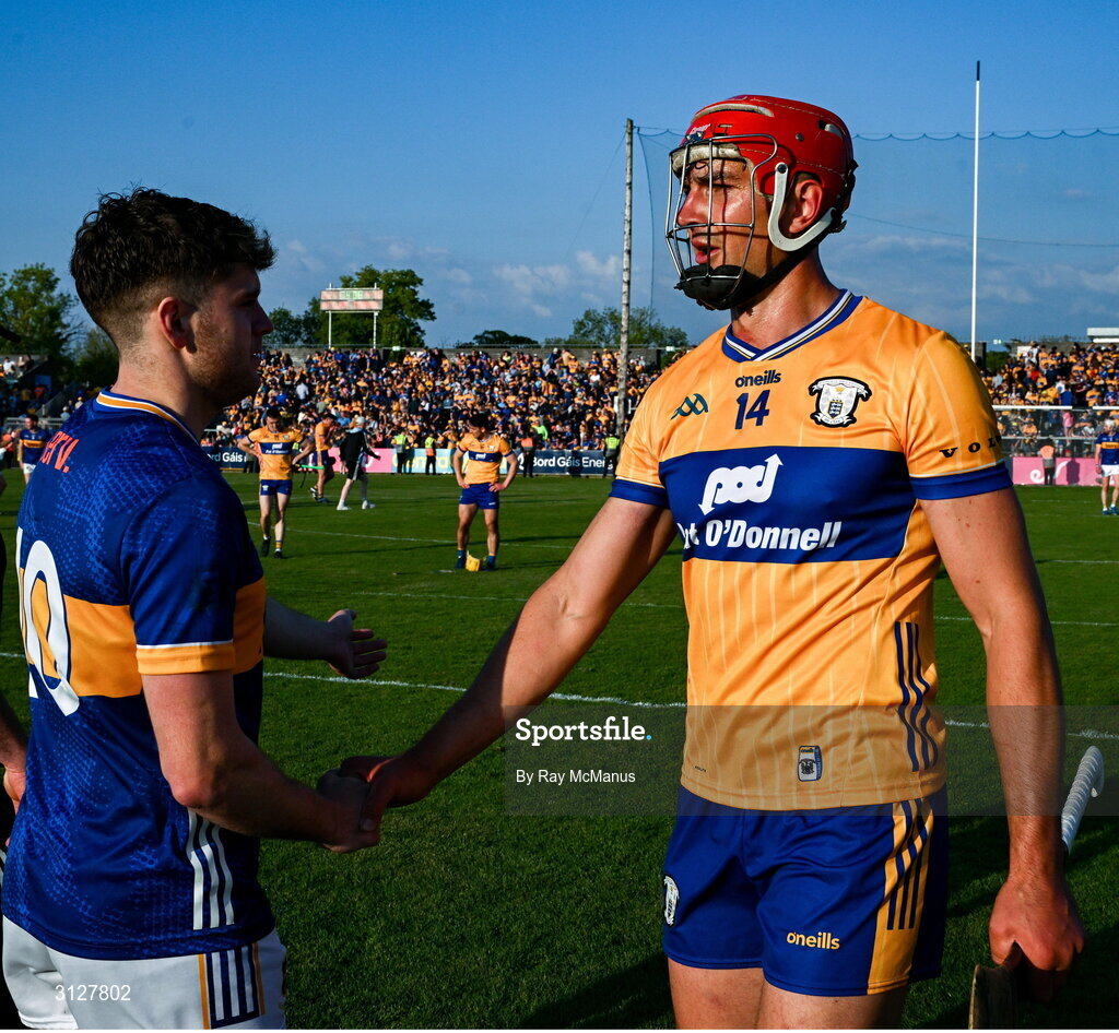 10 May 2025; Conor Stakelum of Tipperary and Peter Duggan of Clare shake hands after the Munster GAA Hurling Senior Championship Round 3 match between Clare and Tipperary at Zimmer Biomet Páirc Chíosóg in Ennis, Clare. Photo by Ray McManus/Sportsfile