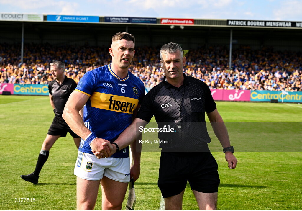 10 May 2025; Ronan Maher of Tipperary shakes hands with referee James Owens before the Munster GAA Hurling Senior Championship Round 3 match between Clare and Tipperary at Zimmer Biomet Páirc Chíosóg in Ennis, Clare. Photo by Ray McManus/Sportsfile