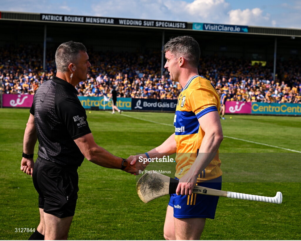 10 May 2025; Tony Kelly of Clare shakes hands with referee James Owens before the Munster GAA Hurling Senior Championship Round 3 match between Clare and Tipperary at Zimmer Biomet Páirc Chíosóg in Ennis, Clare. Photo by Ray McManus/Sportsfile